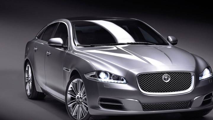 Jaguar XJ In Grey N Grey Background Front Pose